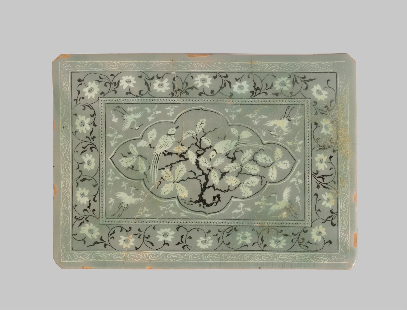 Tile decorated with birds and flowers