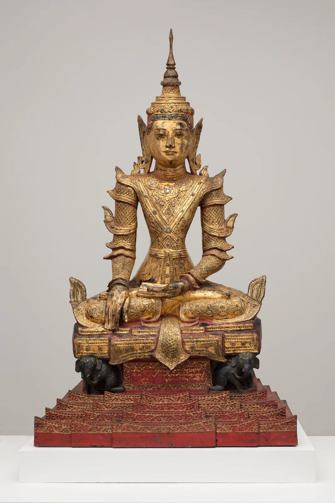 Crowned and Bejewelled Buddha Seated on an Elephant Throne