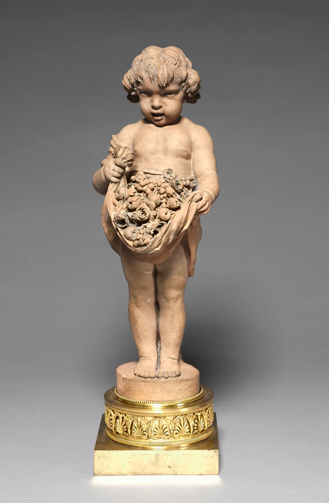 Child Carrying Fruit and Flowers
