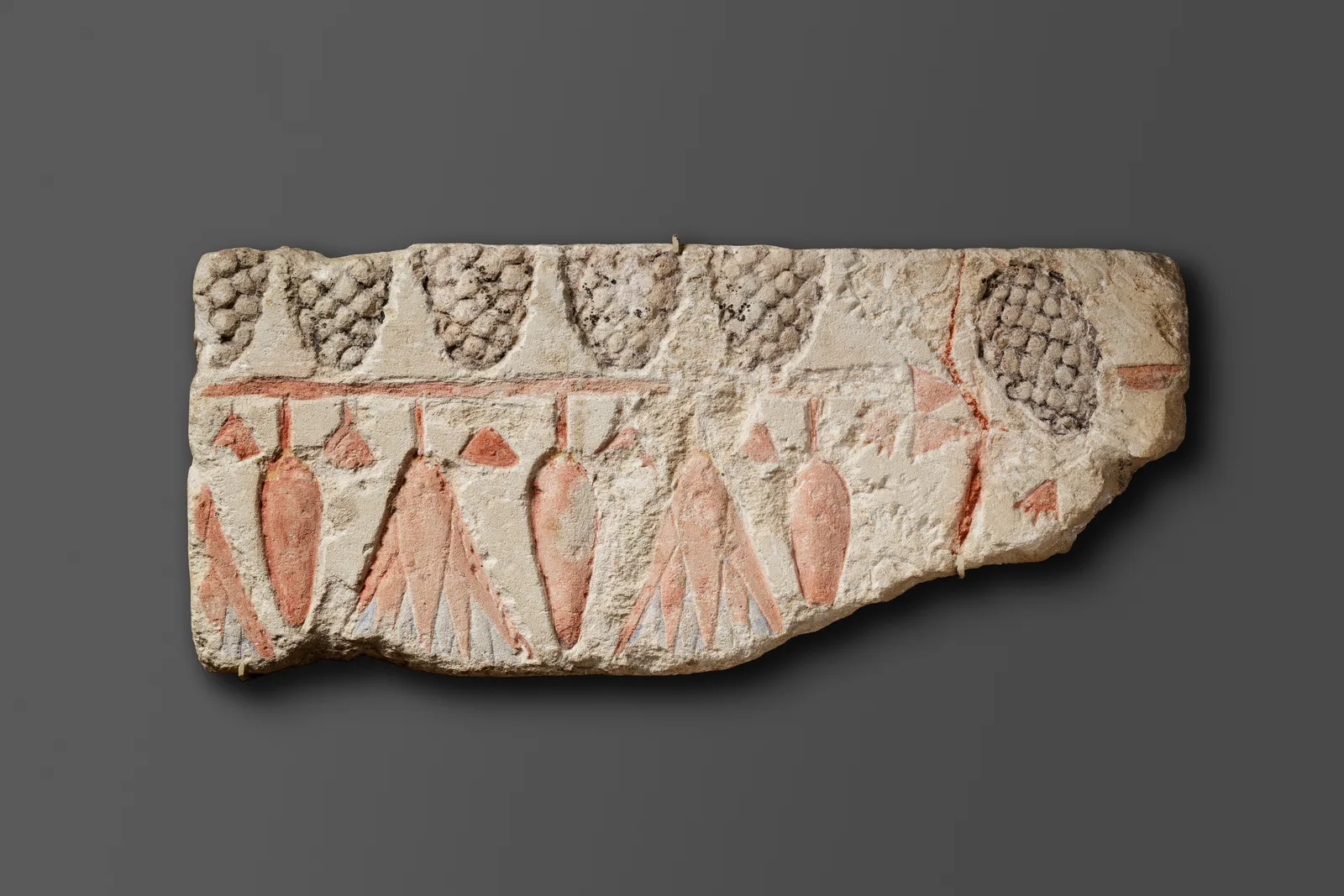 Relief with floral and fructal wall decoration