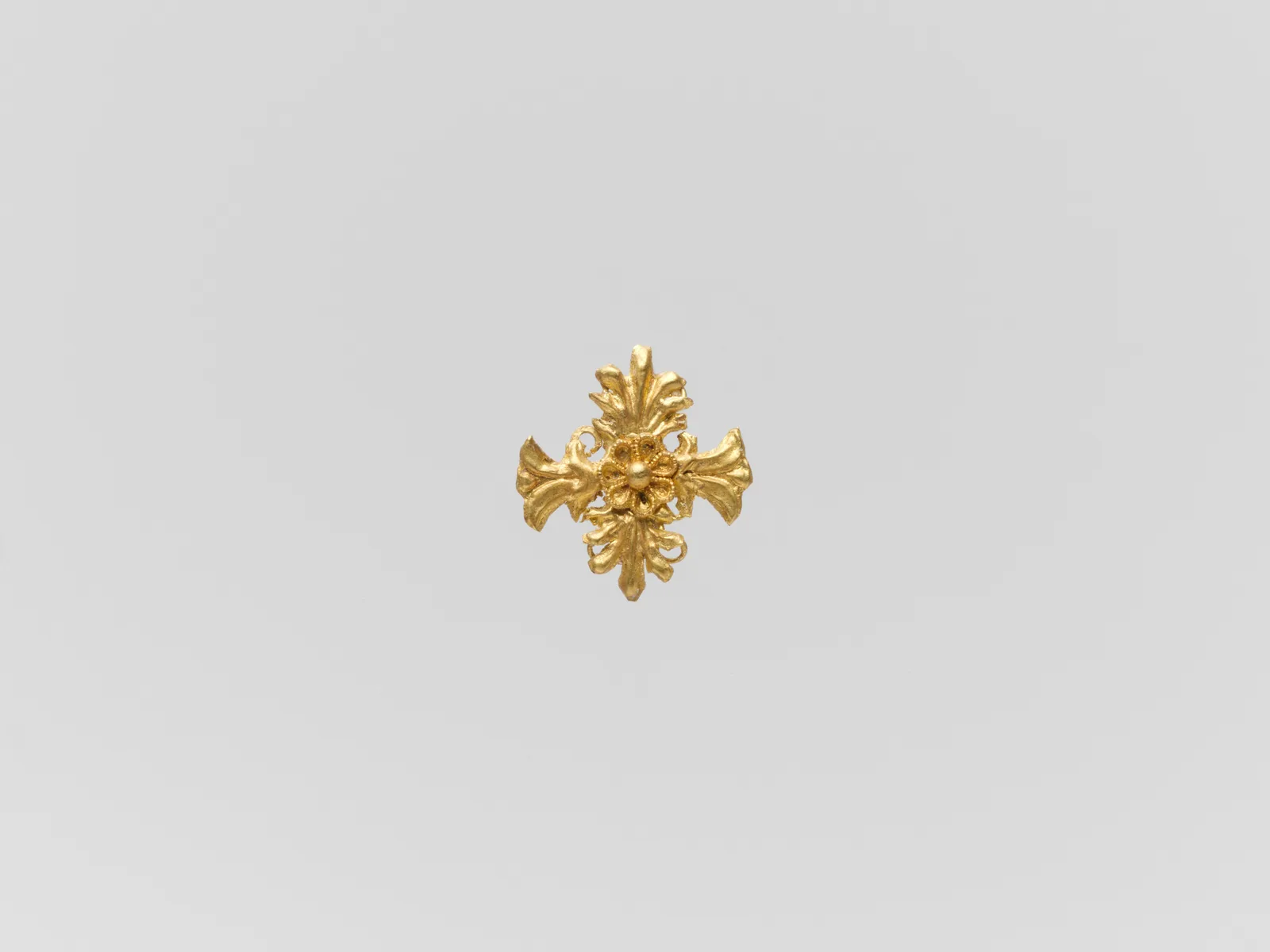 Gold quatrefoil with palmettes and rosette