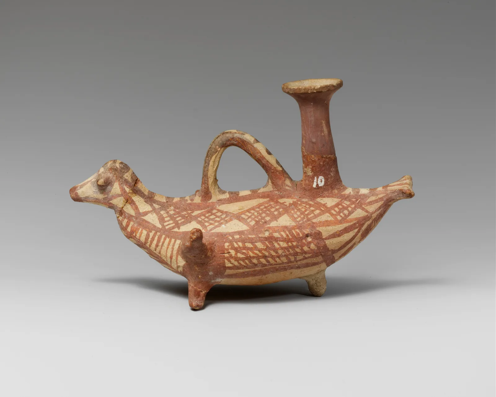 Terracotta askos (flask with a spout and handle over the top) in the form of a bird